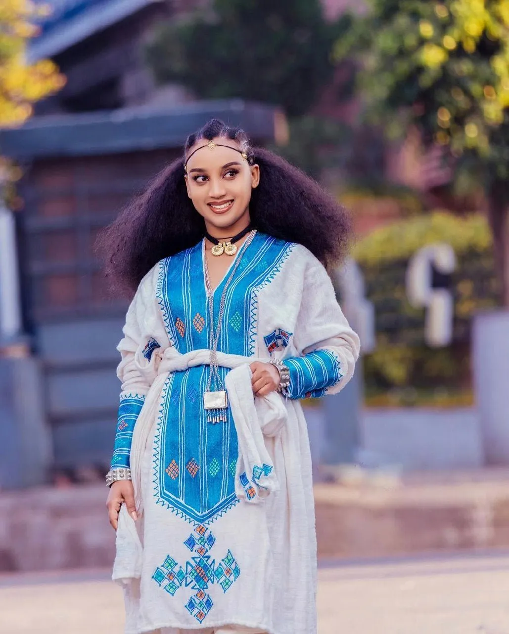 Azure Splendor: Embracing Tradition with a Modern Twist in Habesha Dress-Pants Ensemble