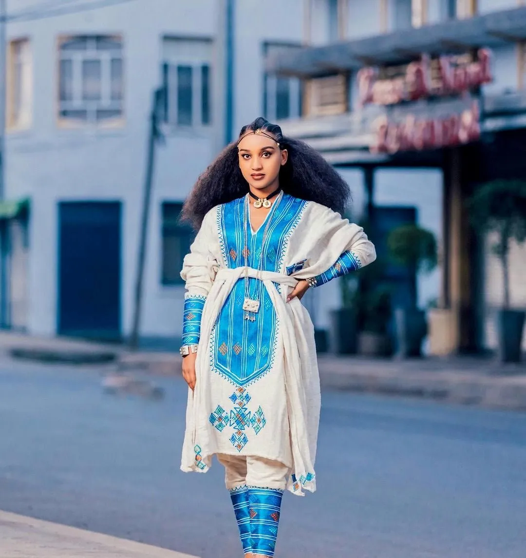 Azure Splendor: Embracing Tradition with a Modern Twist in Habesha Dress-Pants Ensemble