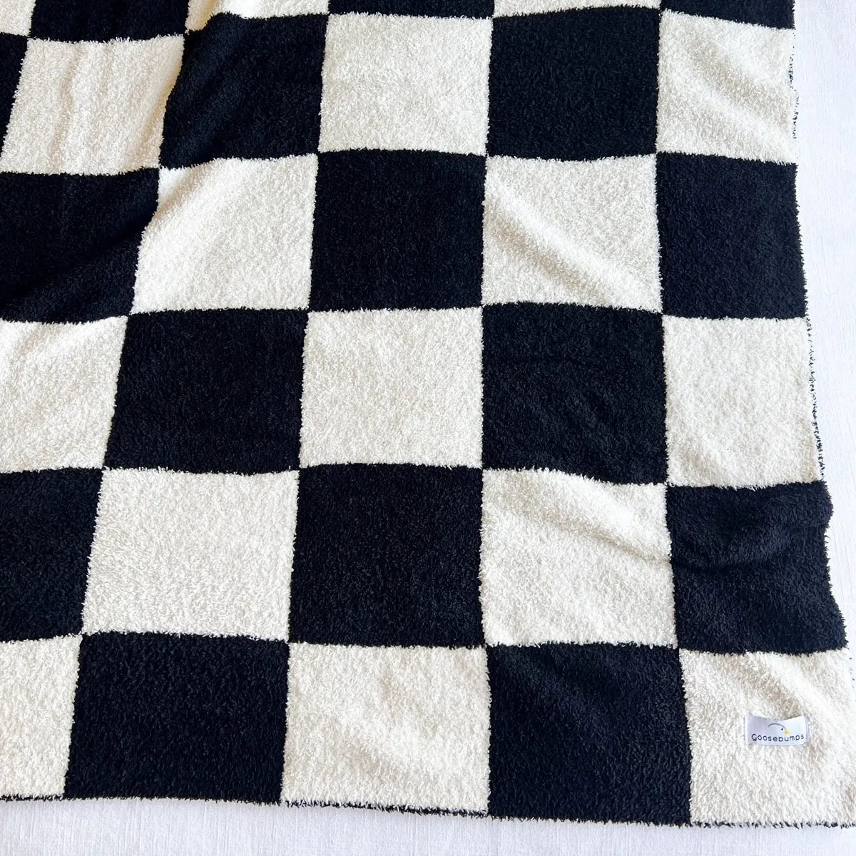 checkerboard / black / plush